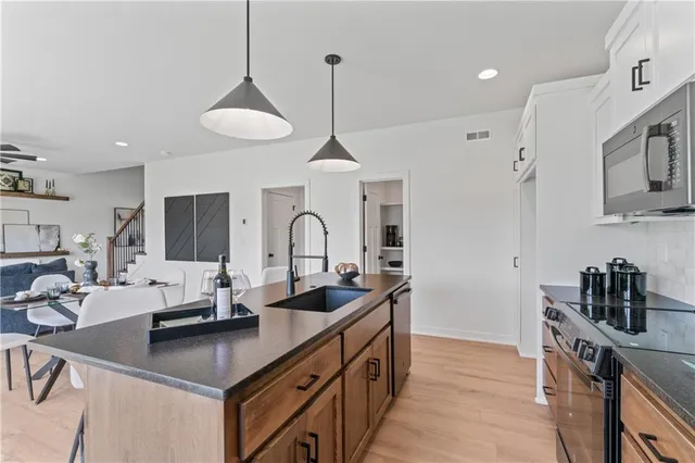 $404,500 | 2004 Southeast Oak Ridge Drive, Oak Grove, MO 64075