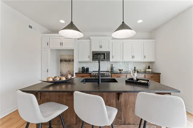 $404,500 | 2004 Southeast Oak Ridge Drive, Oak Grove, MO 64075