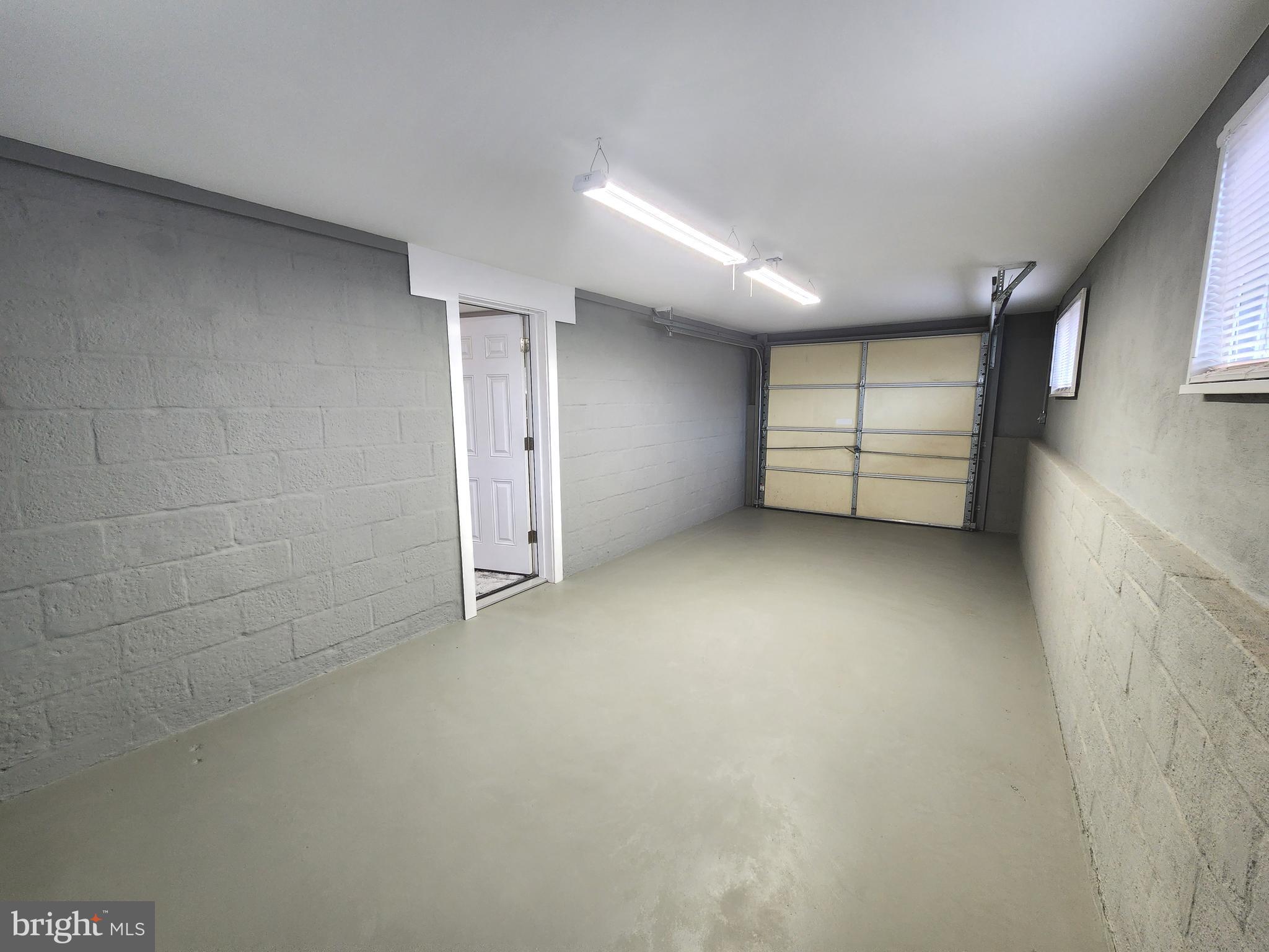 914 Vanderwood Road Catonsville, MD 21228 - Photo 21 of 23 a view of an empty room with a window