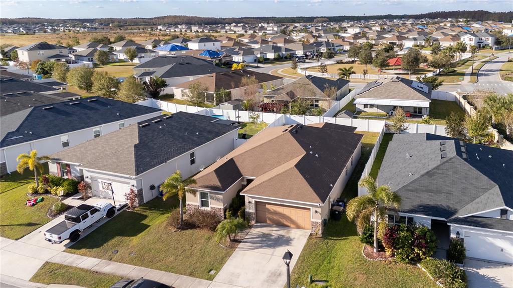 4563 Orchard Grove Road St. Cloud, FL 34772 - Photo 2 of 51 an aerial view of a houses