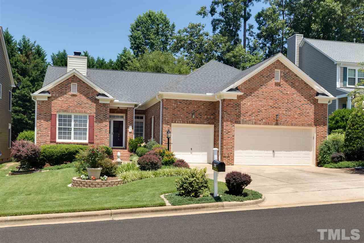 4008 Batiste Road Raleigh, NC 27613 - Photo 1 of 24 front view of a house with a yard