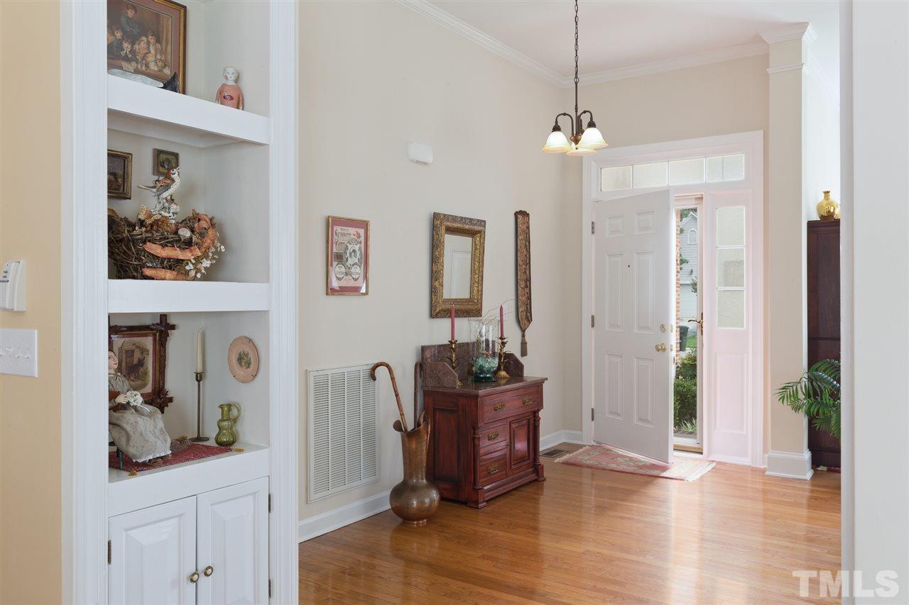 4008 Batiste Road Raleigh, NC 27613 - Photo 2 of 24 a view of a livingroom with furniture and hallway