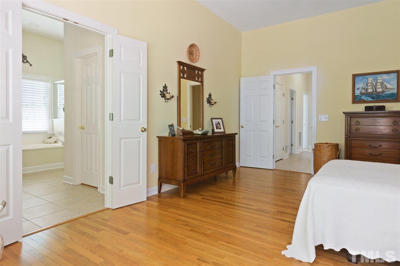 4008 Batiste Road Raleigh, NC 27613 - Photo 15 of 24 a bedroom with furniture and window