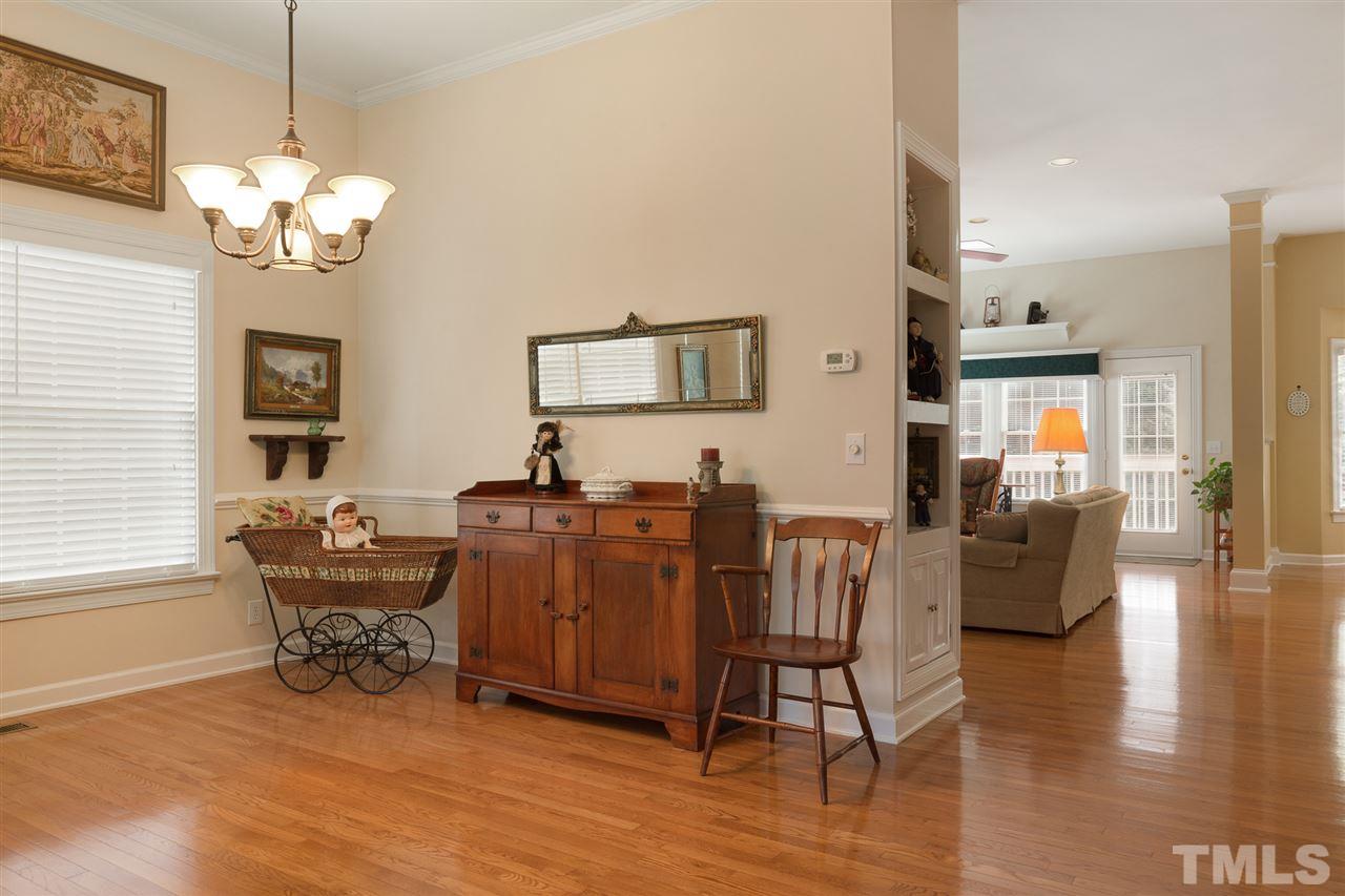 4008 Batiste Road Raleigh, NC 27613 - Photo 5 of 24 a view of a livingroom with furniture and a window