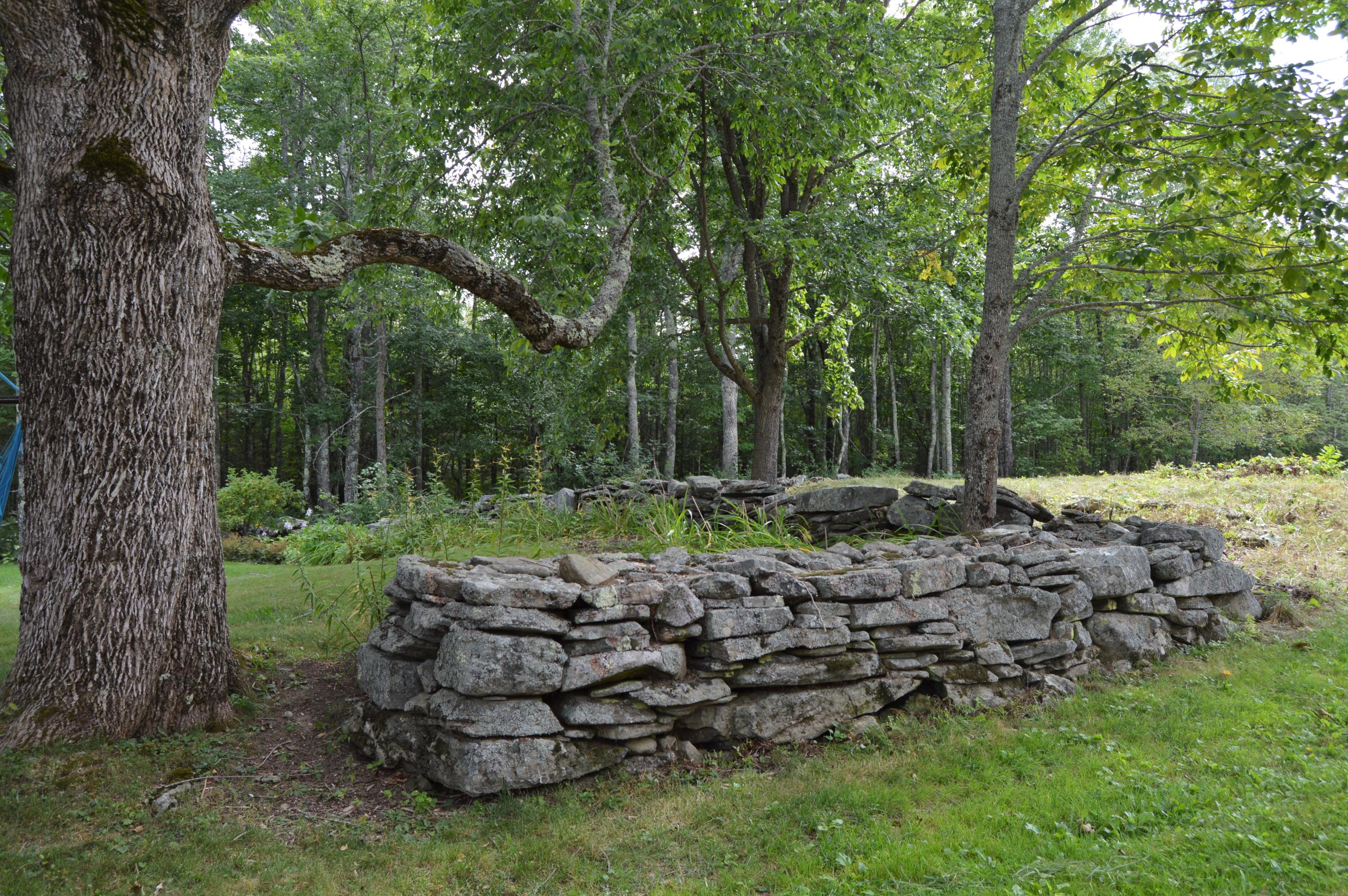 698 East Waldo Road Waldo, ME 04915 - Photo 28 of 31 Stone wall in back of home