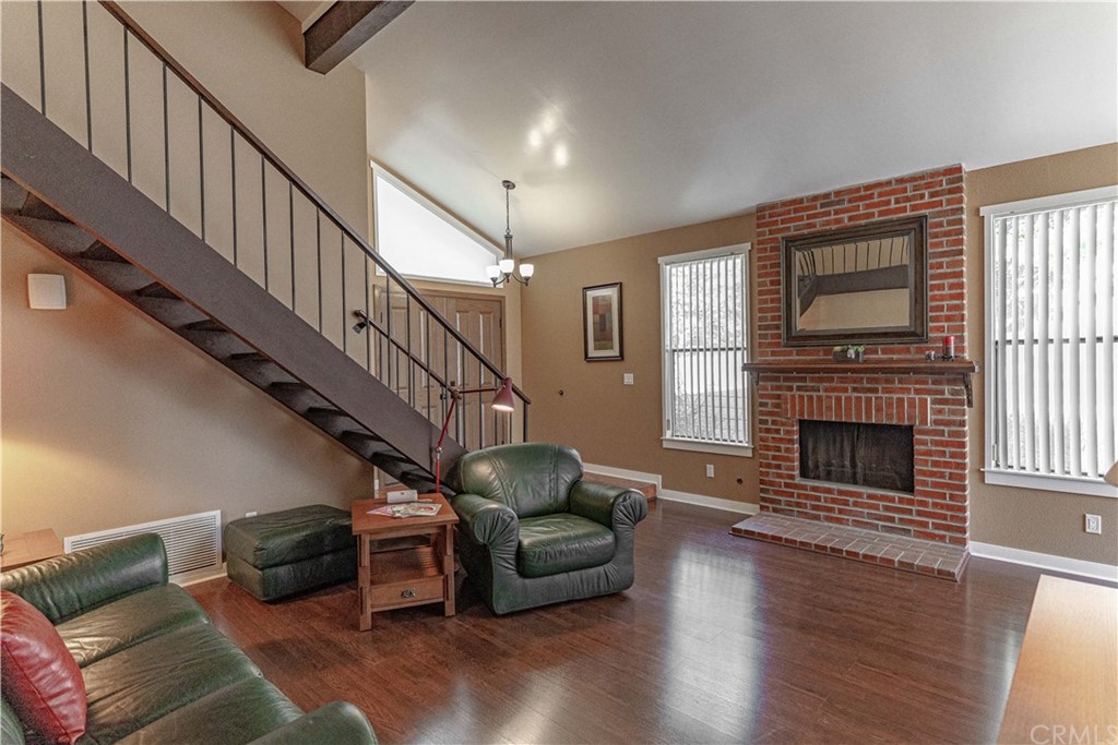 1435 Athena West Covina, CA 91790 - Photo 12 of 45 a living room with furniture and a fireplace