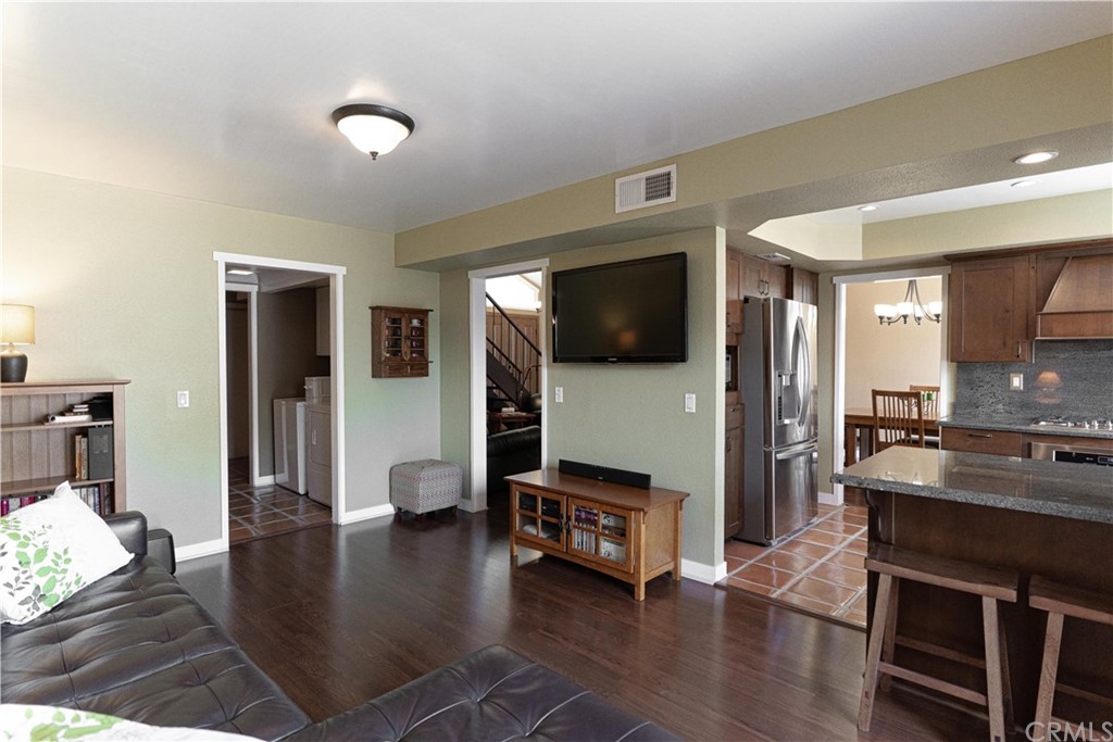 1435 Athena West Covina, CA 91790 - Photo 17 of 45 a living room with furniture and a flat screen tv