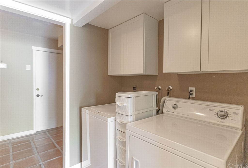 1435 Athena West Covina, CA 91790 - Photo 22 of 45 a view of washer and dryer with bathroom in the background
