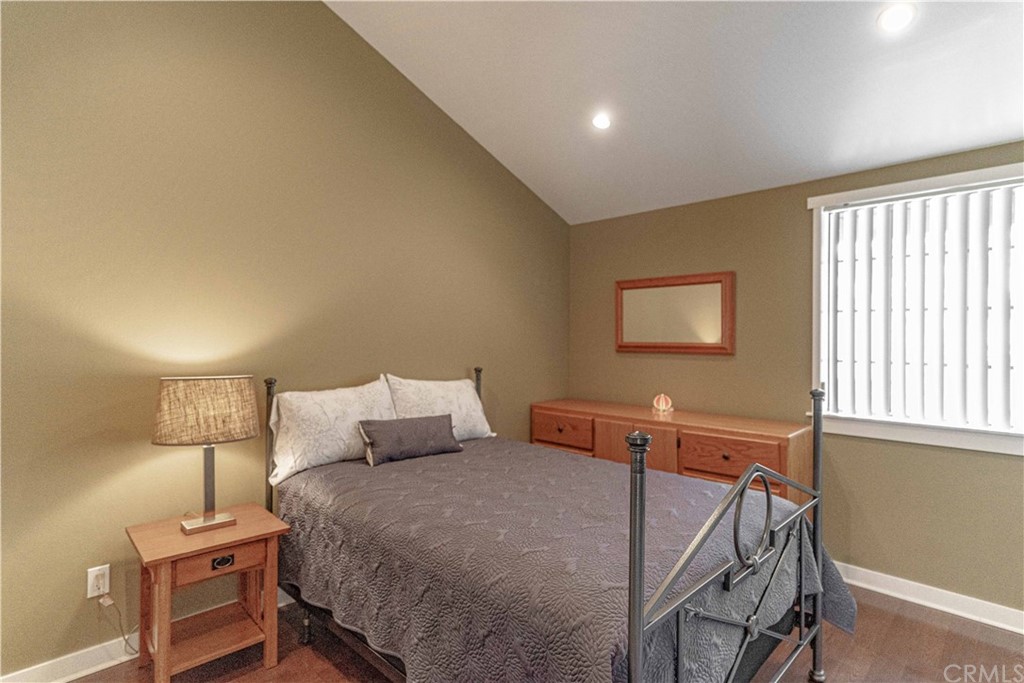 1435 Athena West Covina, CA 91790 - Photo 27 of 45 a bedroom with a bed and a night stand