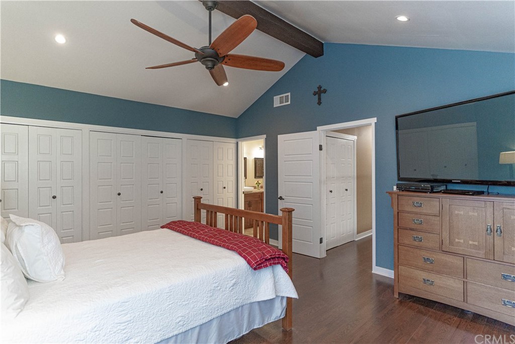 1435 Athena West Covina, CA 91790 - Photo 30 of 45 a bedroom with a large bed and a flat tv screen on dresser