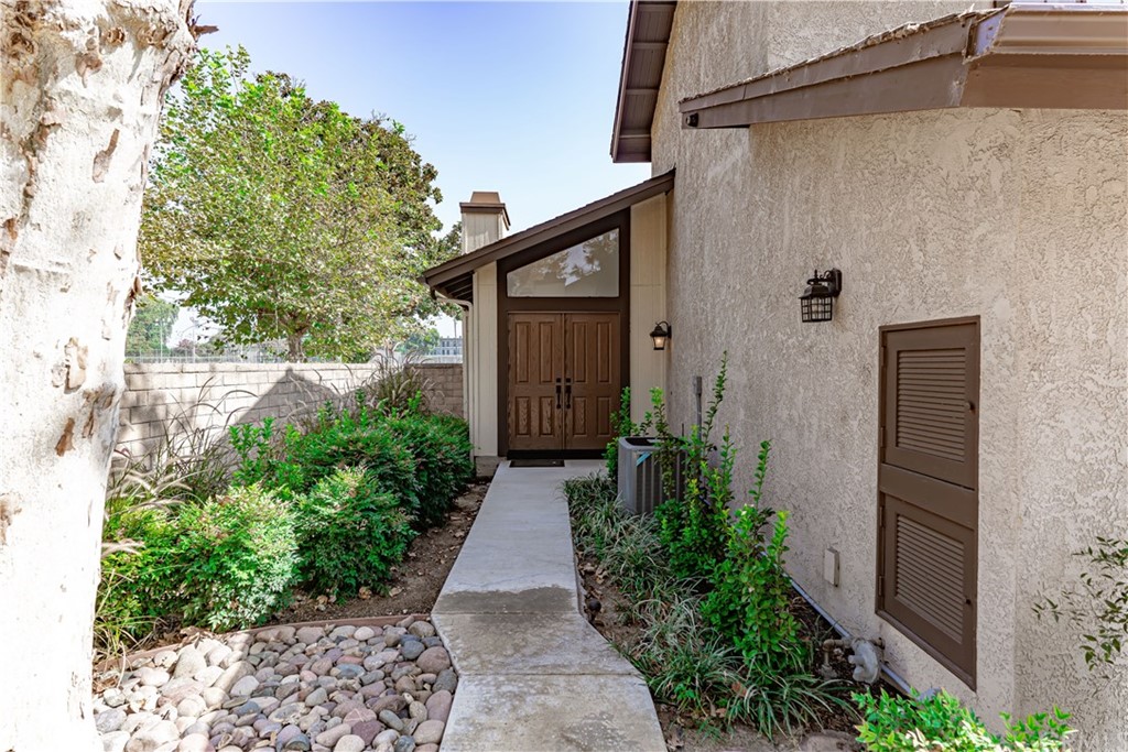 1435 Athena West Covina, CA 91790 - Photo 3 of 45 a backyard of a house with lots of green space