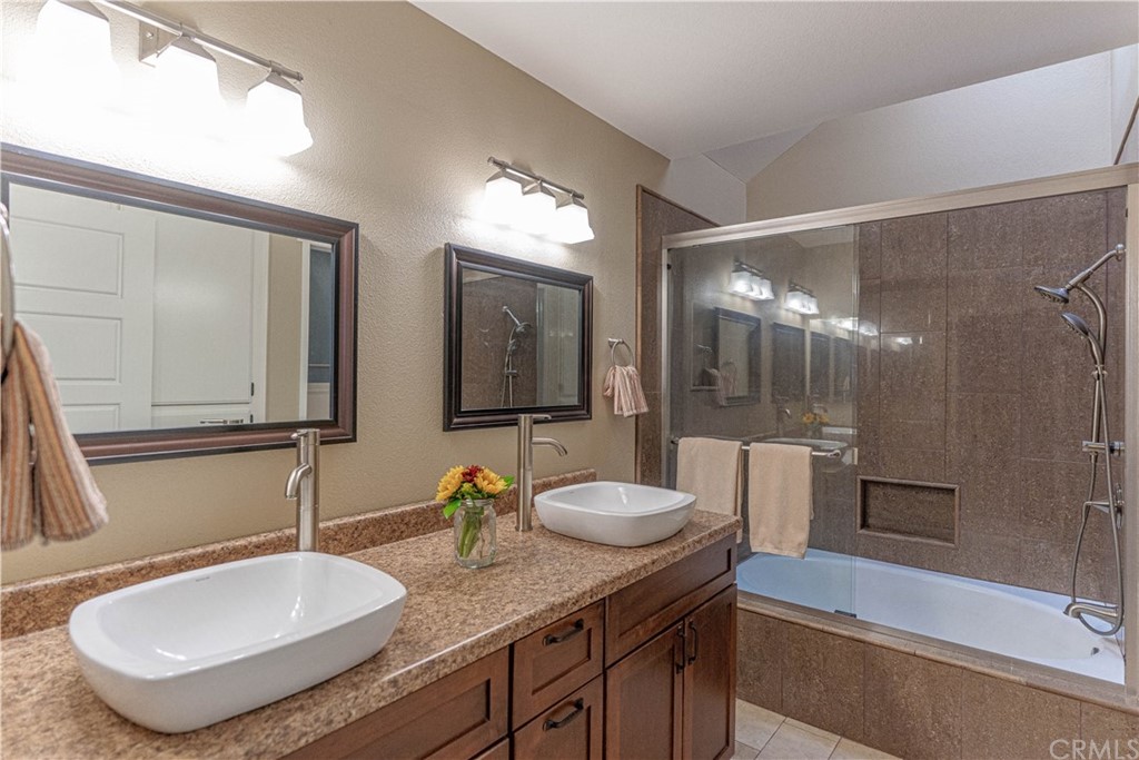 1435 Athena West Covina, CA 91790 - Photo 32 of 45 a bathroom with a granite countertop sink and a mirror