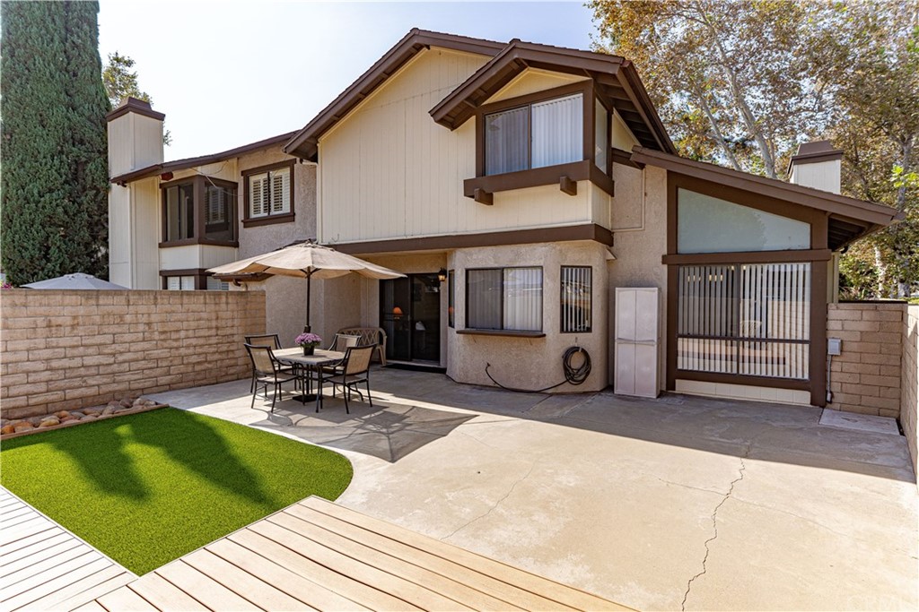 1435 Athena West Covina, CA 91790 - Photo 38 of 45 a front view of a house with patio and a garden