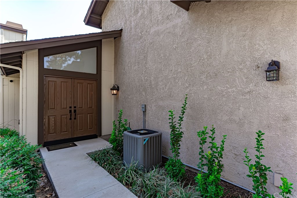 1435 Athena West Covina, CA 91790 - Photo 4 of 45 a front view of a house with potted plants