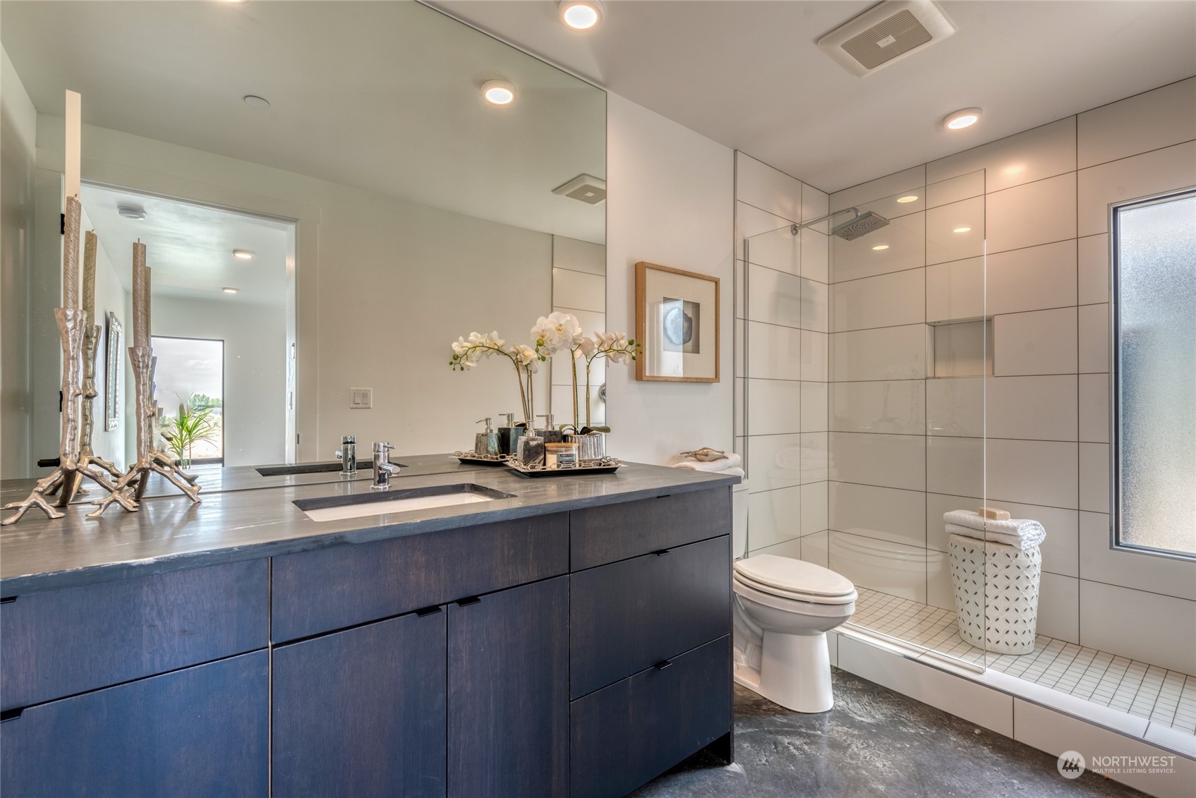 232 (lot 31) Nw Rattlesnake Point Road Quincy, WA 98848 - Photo 26 of 37 a bathroom with a double vanity sink toilet and a mirror