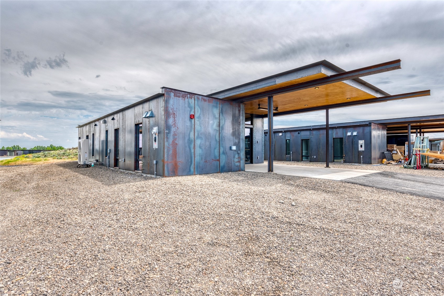 232 (lot 31) Nw Rattlesnake Point Road Quincy, WA 98848 - Photo 31 of 37 a house with wooden fence in front of it