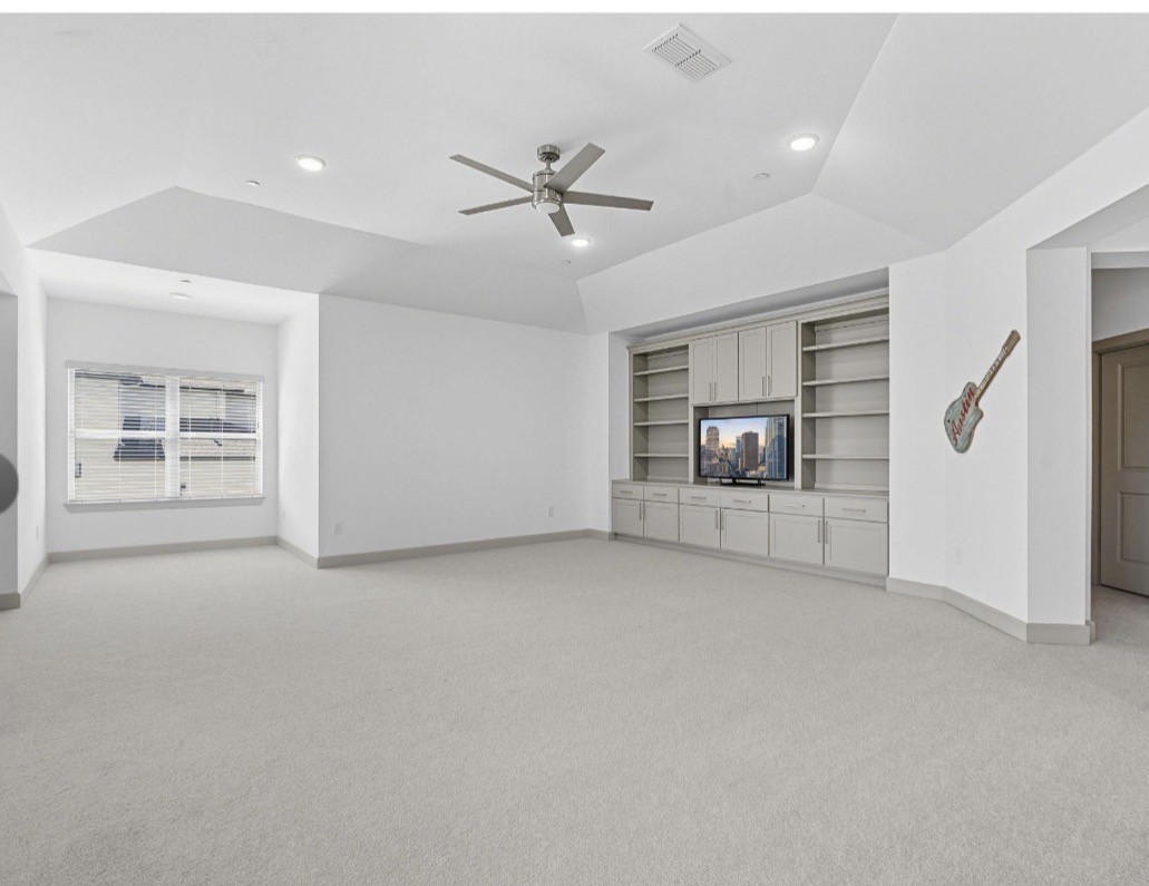 6817 Davenport Divide Road Austin, TX 78738 - Photo 18 of 28 a view of an empty room with a window