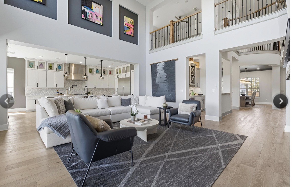 6817 Davenport Divide Road Austin, TX 78738 - Photo 2 of 28 a living room with furniture and wooden floor