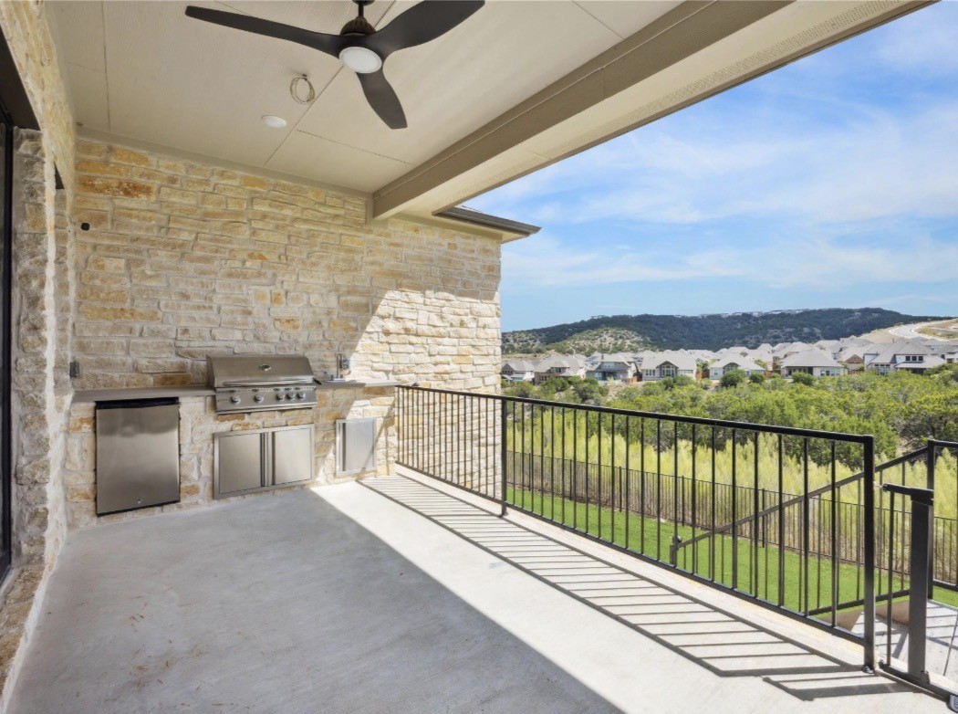 6817 Davenport Divide Road Austin, TX 78738 - Photo 26 of 28 a view of a balcony with an outdoor space
