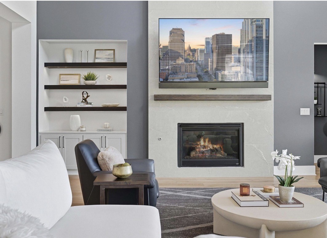 6817 Davenport Divide Road Austin, TX 78738 - Photo 3 of 28 a living room with furniture a table and decor
