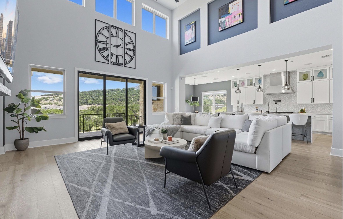 6817 Davenport Divide Road Austin, TX 78738 - Photo 4 of 28 a living room with furniture and large windows