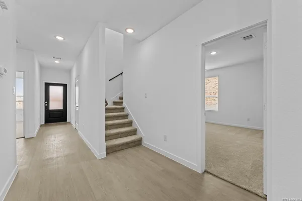 a bathroom with a sink a toilet and bathtub