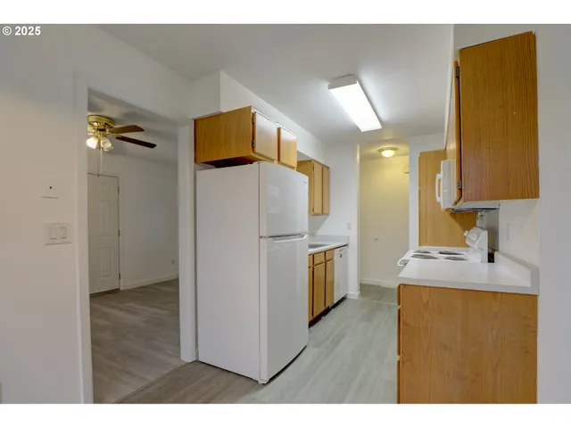 a bathroom with a sink a mirror and a shower