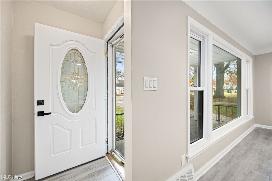 4892 Corliss Road Cleveland, OH 44124 - Photo 9 of 35 Entrance foyer featuring light hardwood / wood-style floors