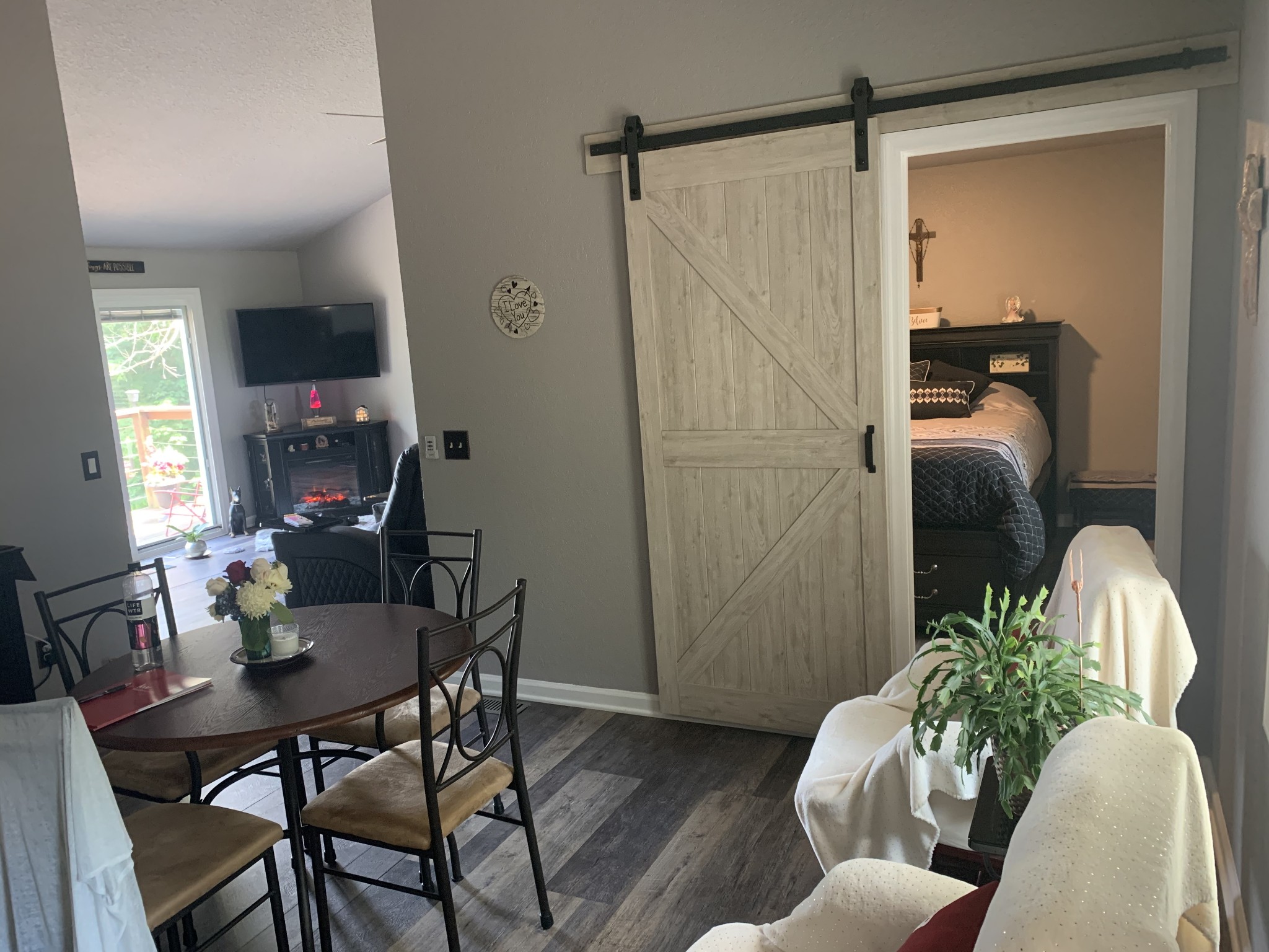 975 Rolling Acres Road Smithville, TN 37166 - Photo 11 of 26 a dining room with furniture and wooden floor