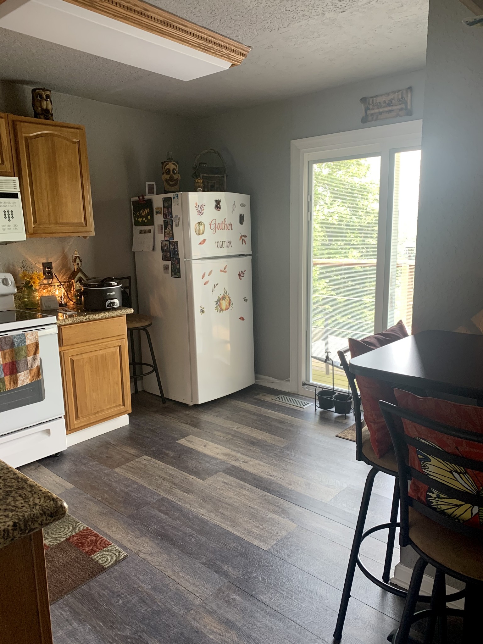 975 Rolling Acres Road Smithville, TN 37166 - Photo 15 of 26 a view of a workspace with furniture and a window