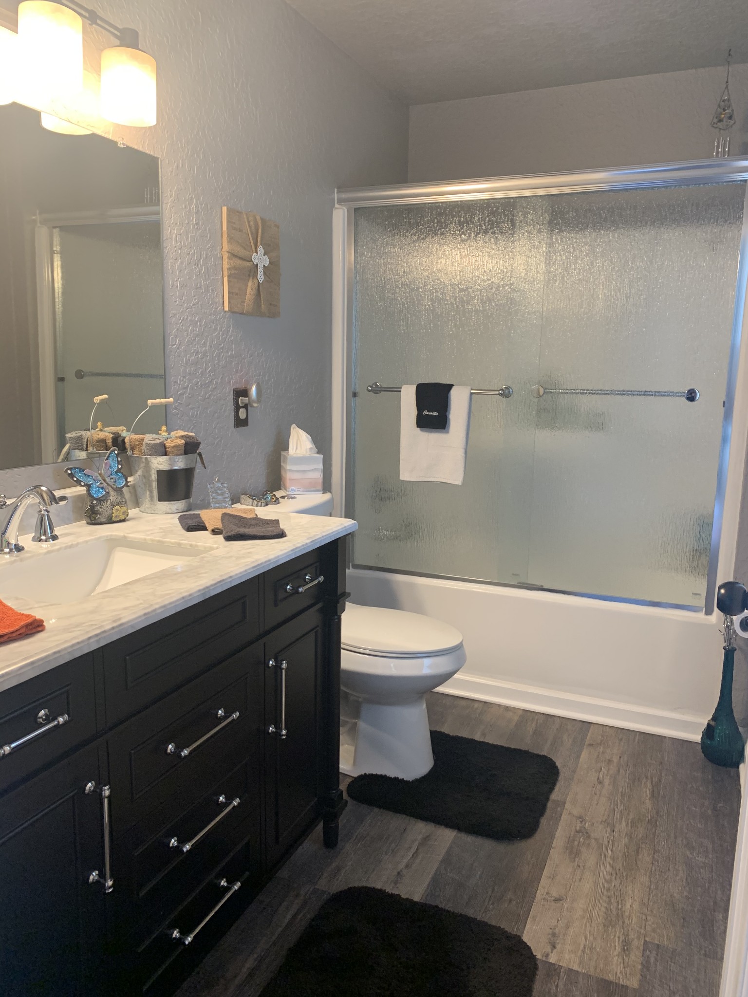 975 Rolling Acres Road Smithville, TN 37166 - Photo 17 of 26 a bathroom with a sink a toilet and shower