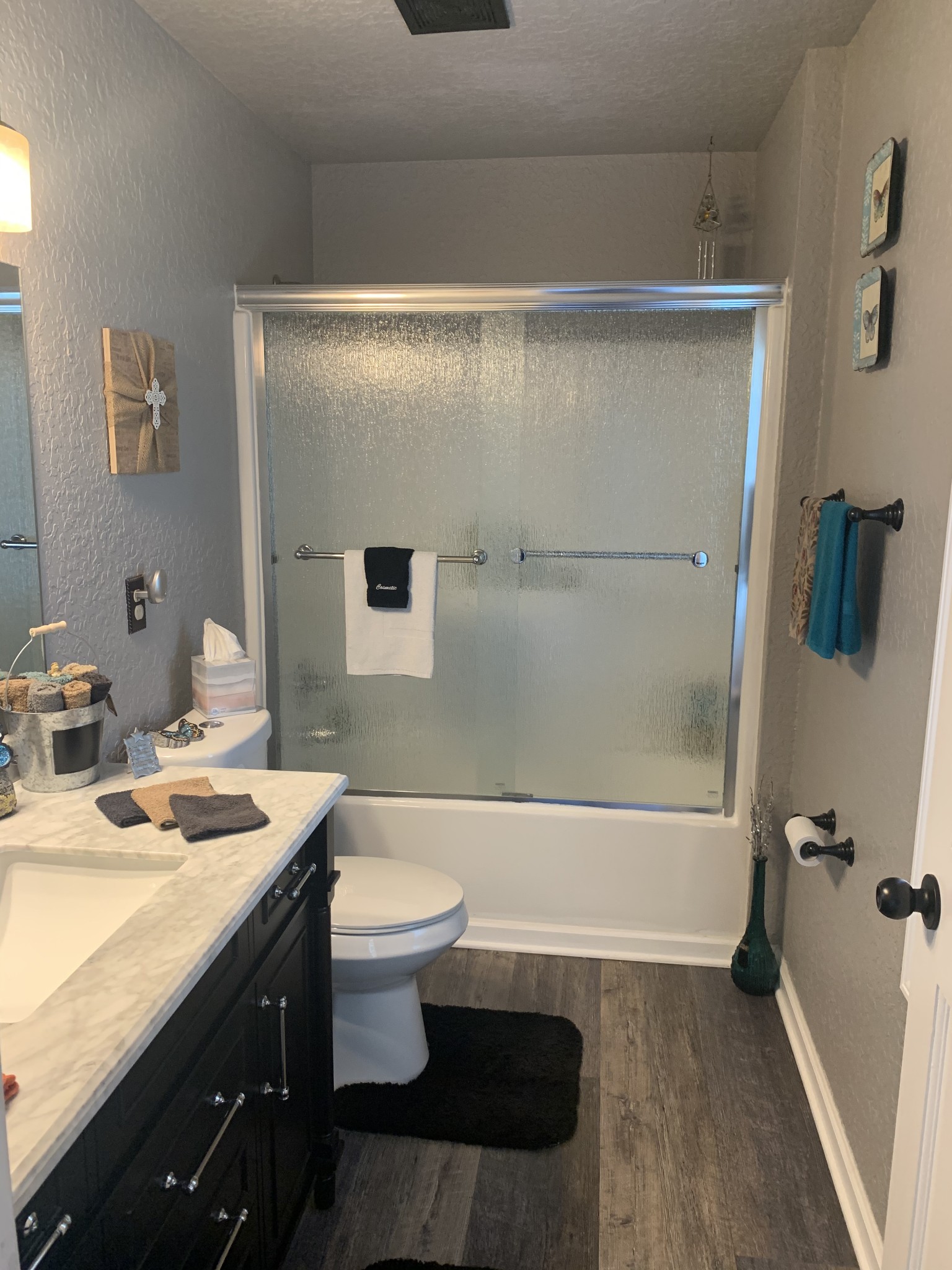 975 Rolling Acres Road Smithville, TN 37166 - Photo 18 of 26 a bathroom with a sink a toilet and a bathtub