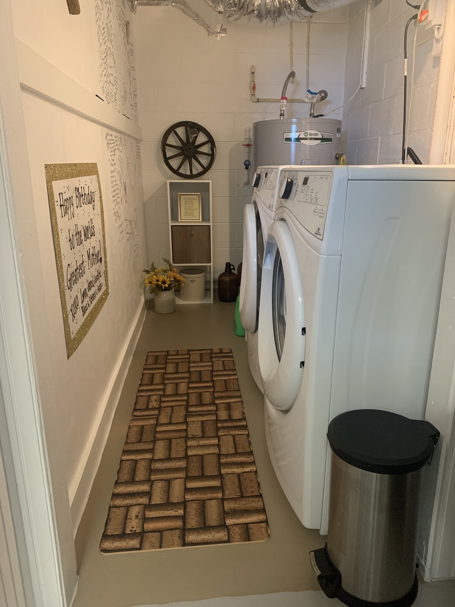 975 Rolling Acres Road Smithville, TN 37166 - Photo 21 of 26 a bathroom with a washing machine and a washing machine