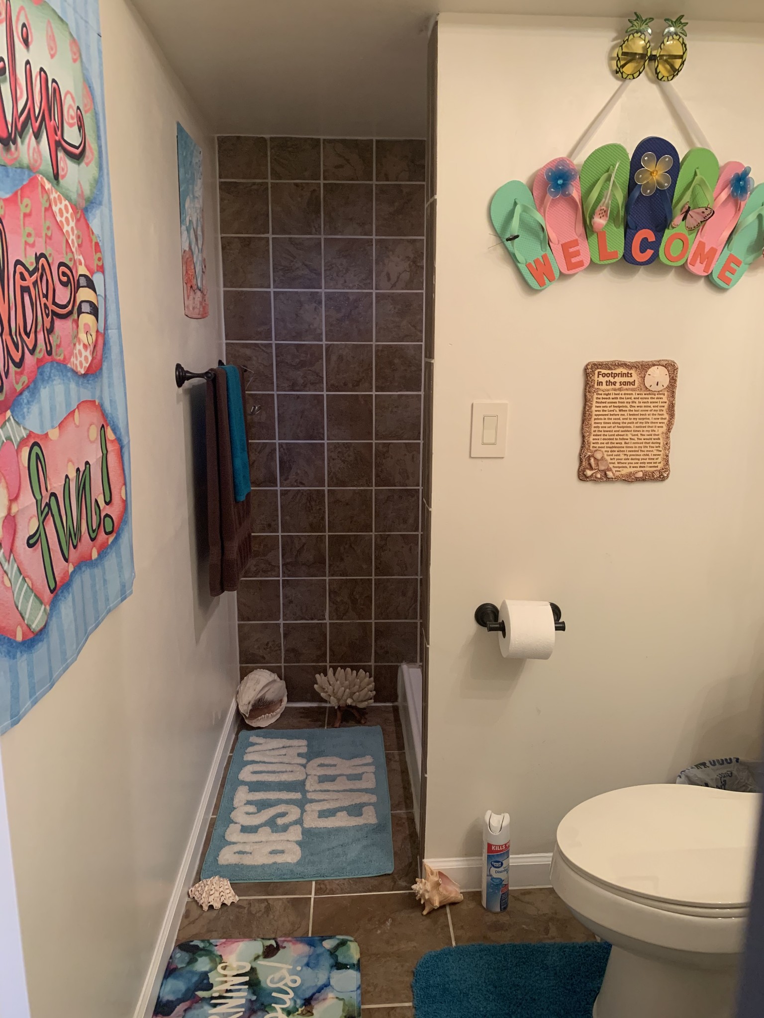 975 Rolling Acres Road Smithville, TN 37166 - Photo 25 of 26 a bathroom with a toilet and shower curtain