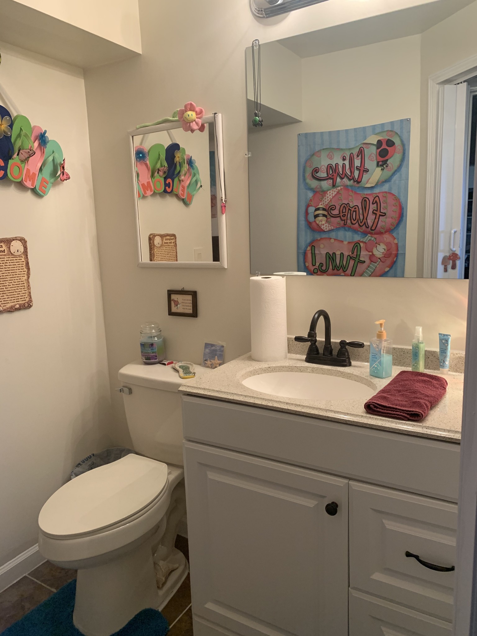 975 Rolling Acres Road Smithville, TN 37166 - Photo 26 of 26 a bathroom with a toilet a sink and mirror