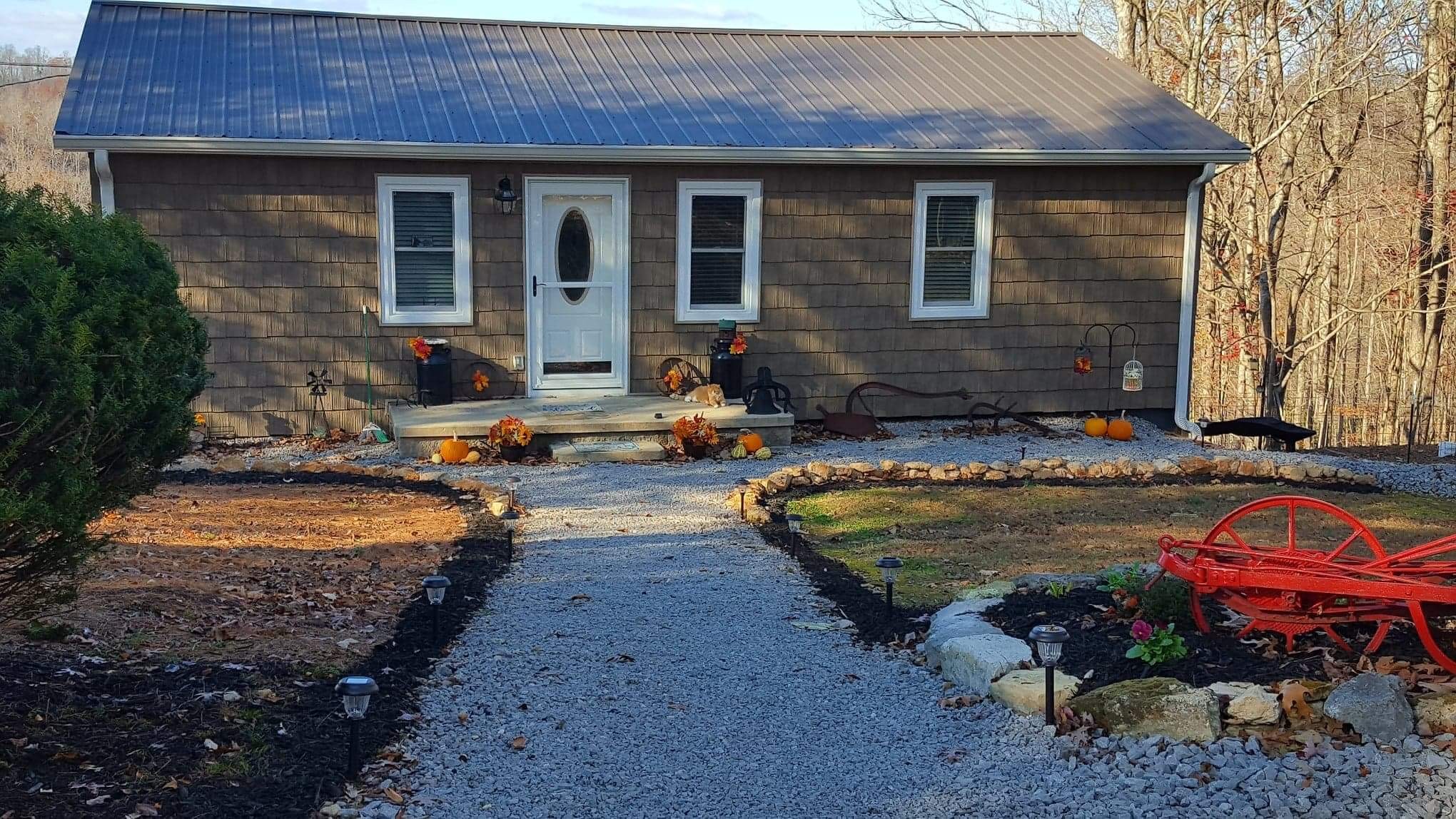 975 Rolling Acres Road Smithville, TN 37166 - Photo 8 of 26 a view of a house with backyard and sitting area