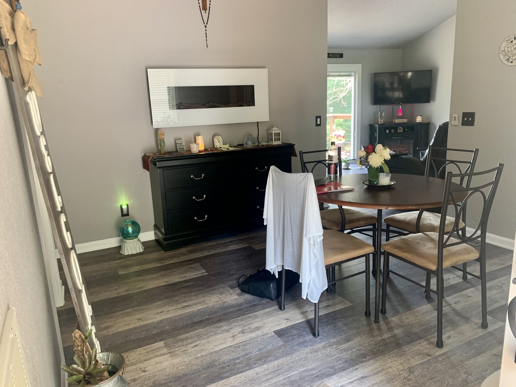 975 Rolling Acres Road Smithville, TN 37166 - Photo 10 of 26 a living room with furniture and a flat screen tv