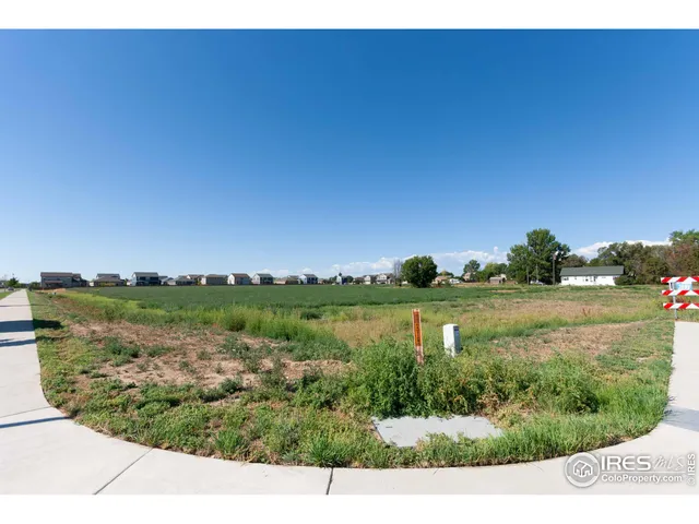 a view of lake with green space