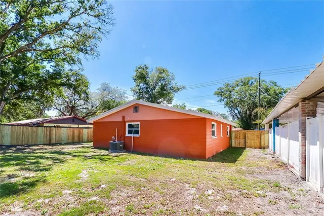 a house with trees in the background