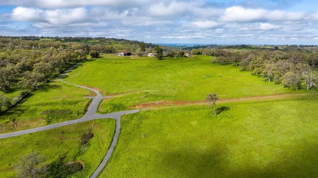 a view of an ocean and a yard