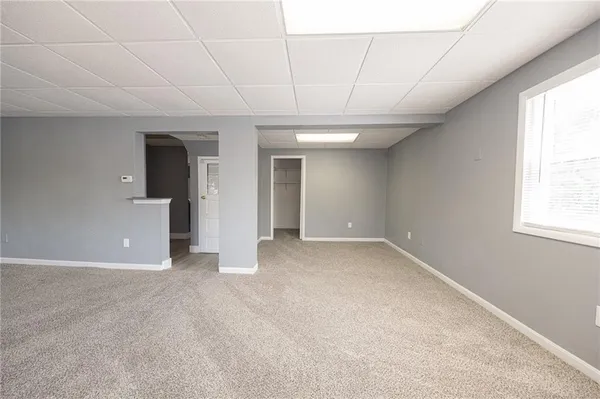 an empty room with windows