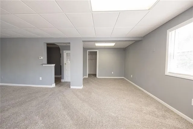 an empty room with windows