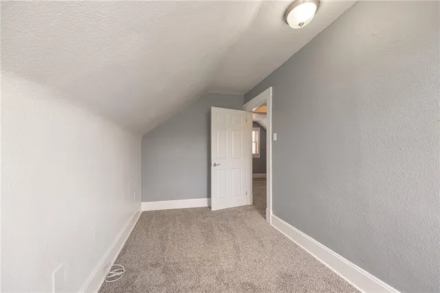 a view of hallway with closet