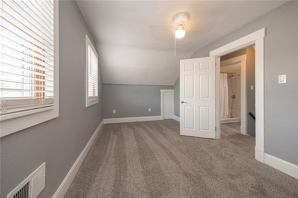 1214 Washington Pike Bridgeville, PA 15017 - Photo 21 of 39 an empty room with windows and closet