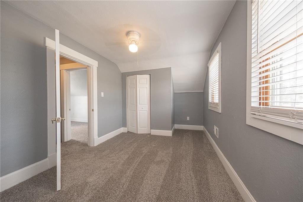 1214 Washington Pike Bridgeville, PA 15017 - Photo 22 of 39 a view of an empty room with a window