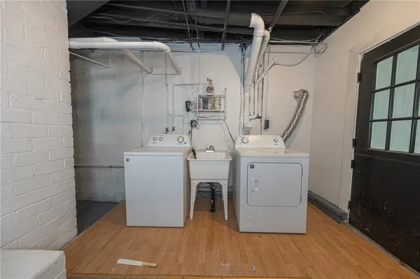 a utility room with dryer and washer