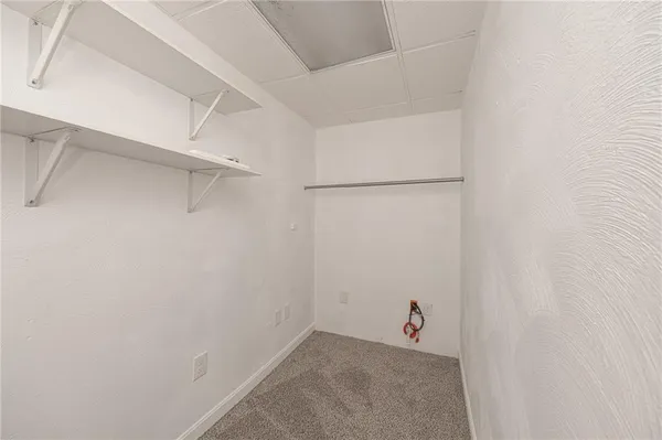 a small space with a book shelf