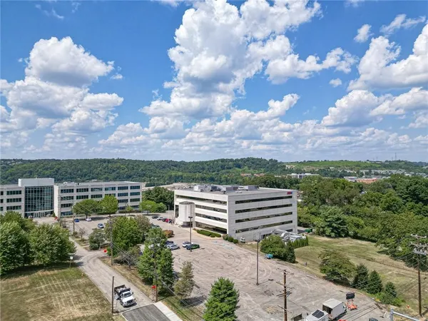 a view of a city with tall buildings