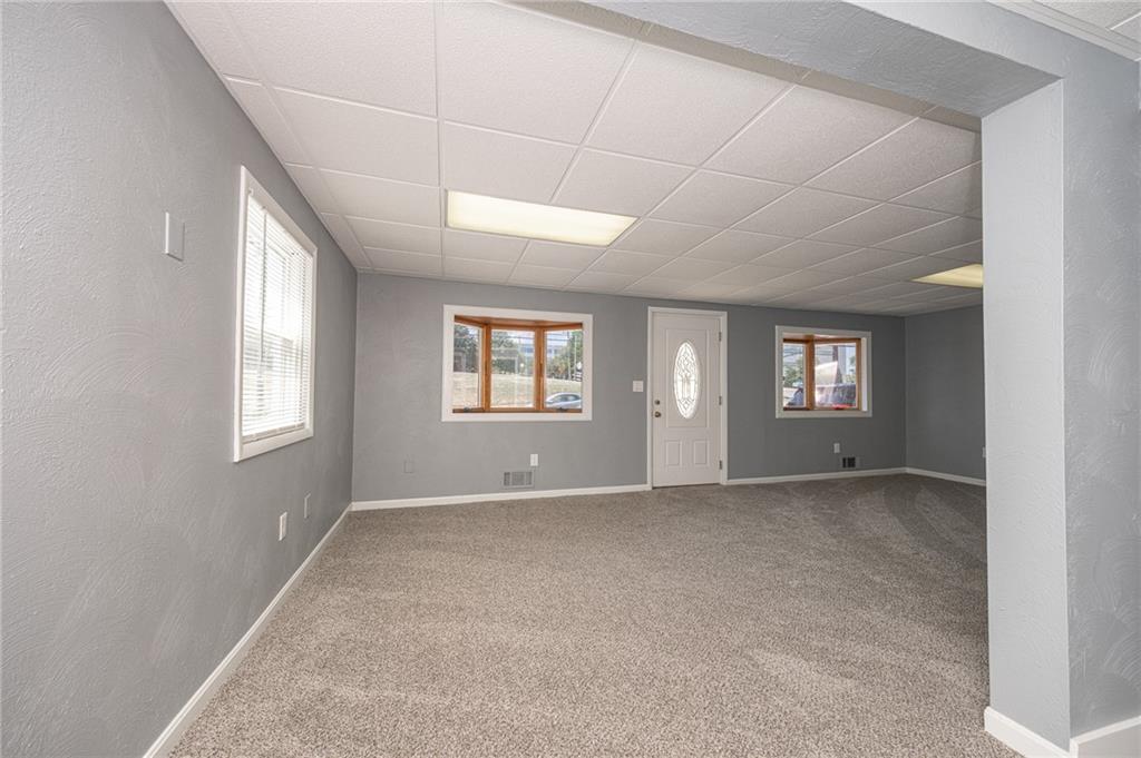 1214 Washington Pike Bridgeville, PA 15017 - Photo 7 of 39 a view of an empty room with a window