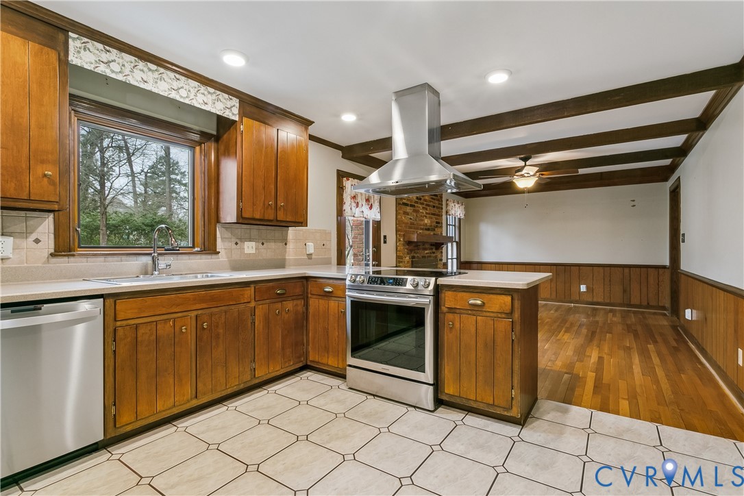 504 Meadowfield Road Yorktown, VA 23692 - Photo 14 of 45 a kitchen with stainless steel appliances granite countertop a sink and a stove